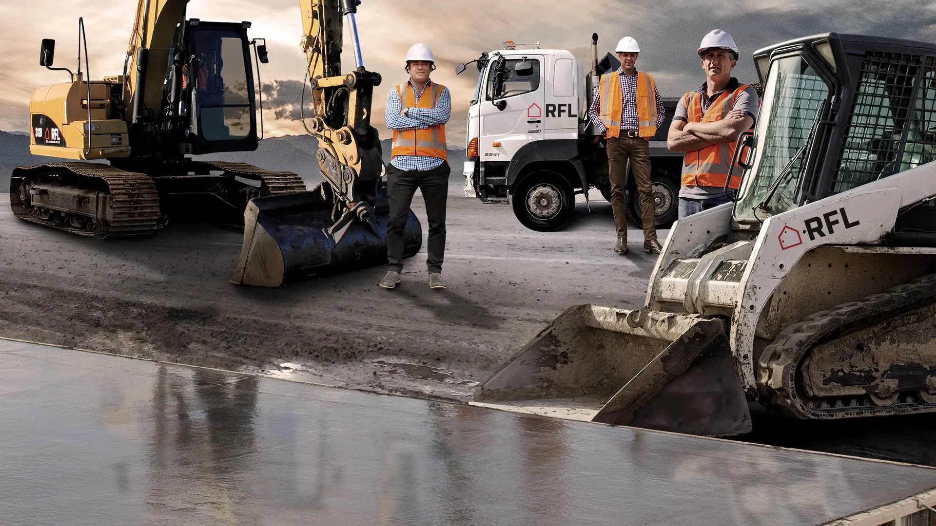 RFL crew with an excavator, skid steer and RFL truck on a building site